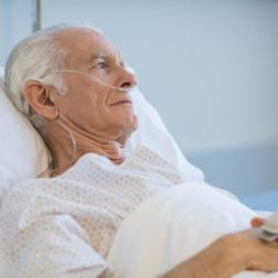 Man in hospital bed